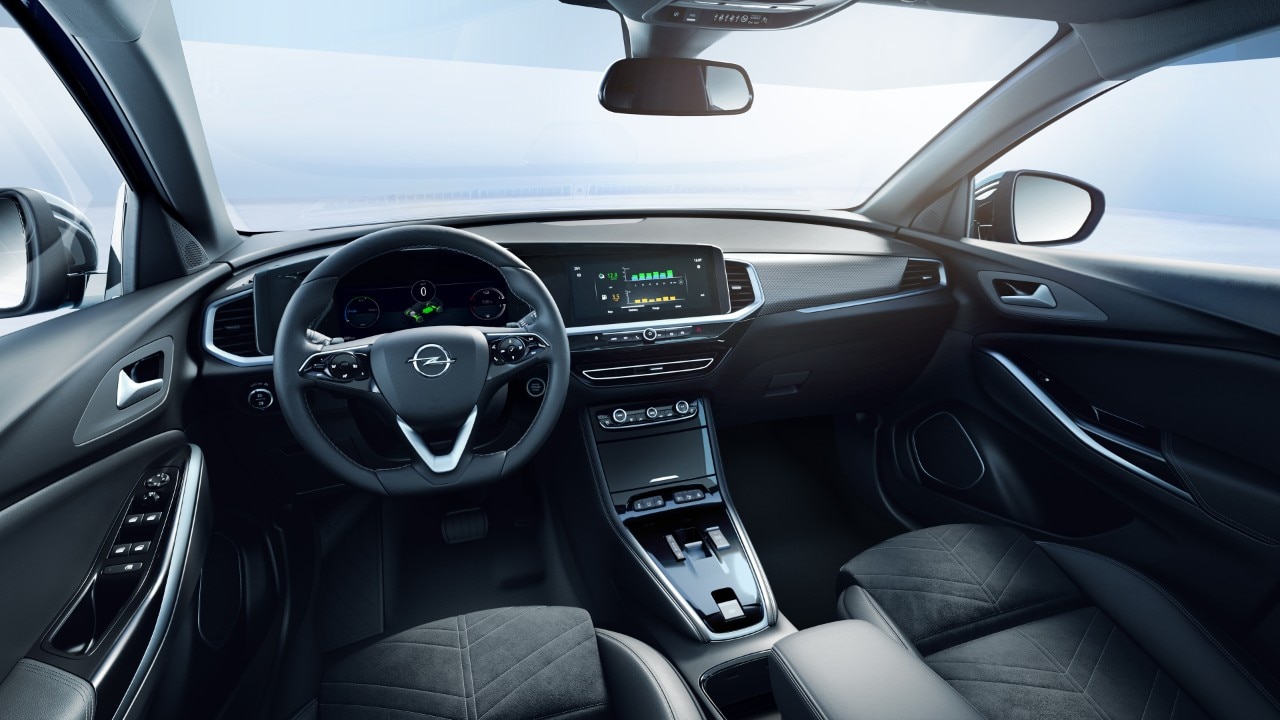 Vue arrière des sièges avant et de l'habitacle d'une Opel Grandland Hybride Rechargeable