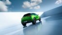Задний фасад электрической вертеи Opel Mokka с черными ободами и крышами